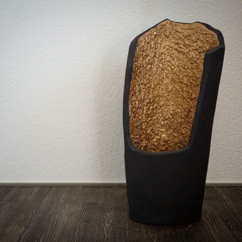 Grottenlicht schwarz gold